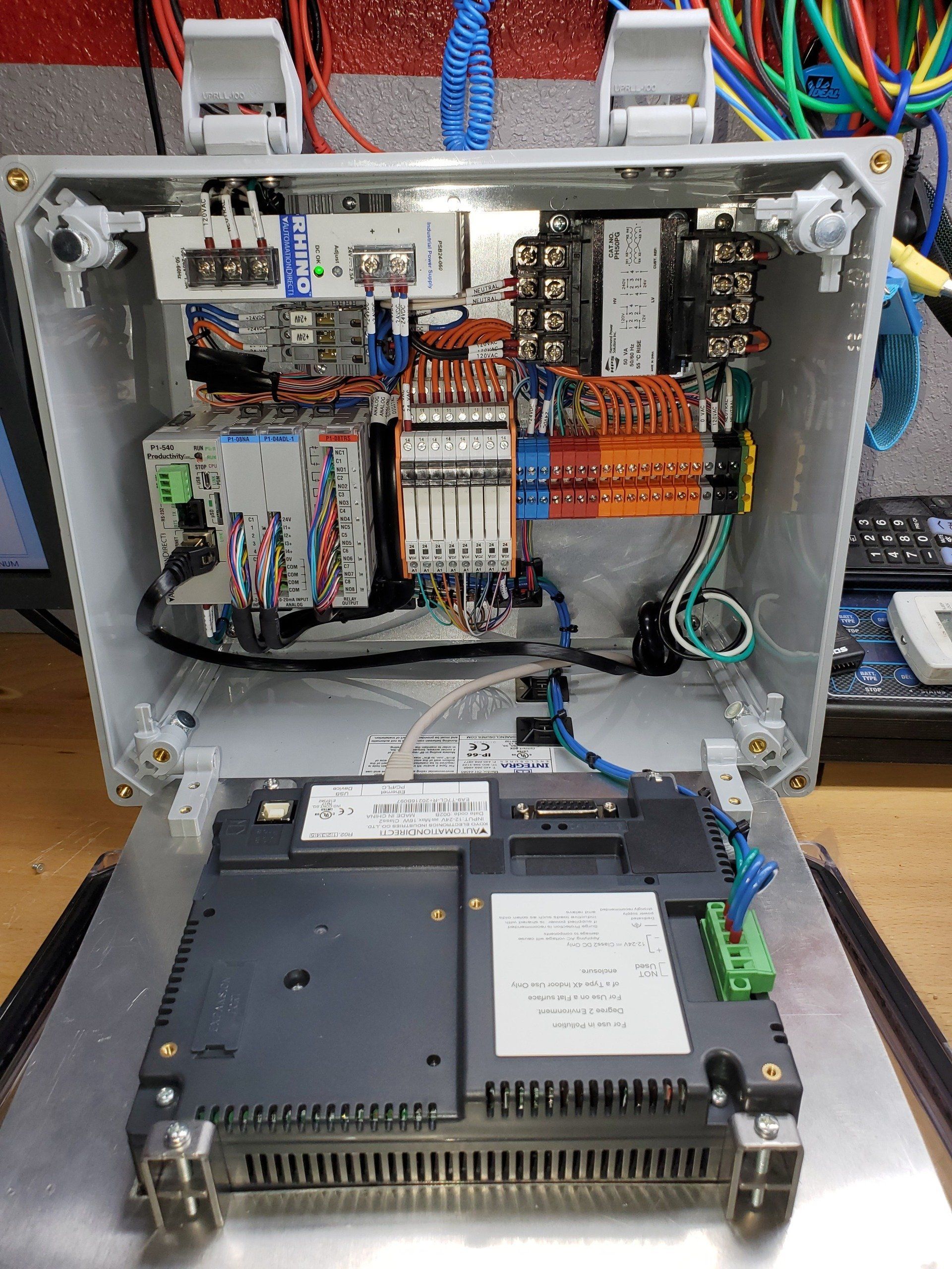 PLC and HMI control panel built by EMS