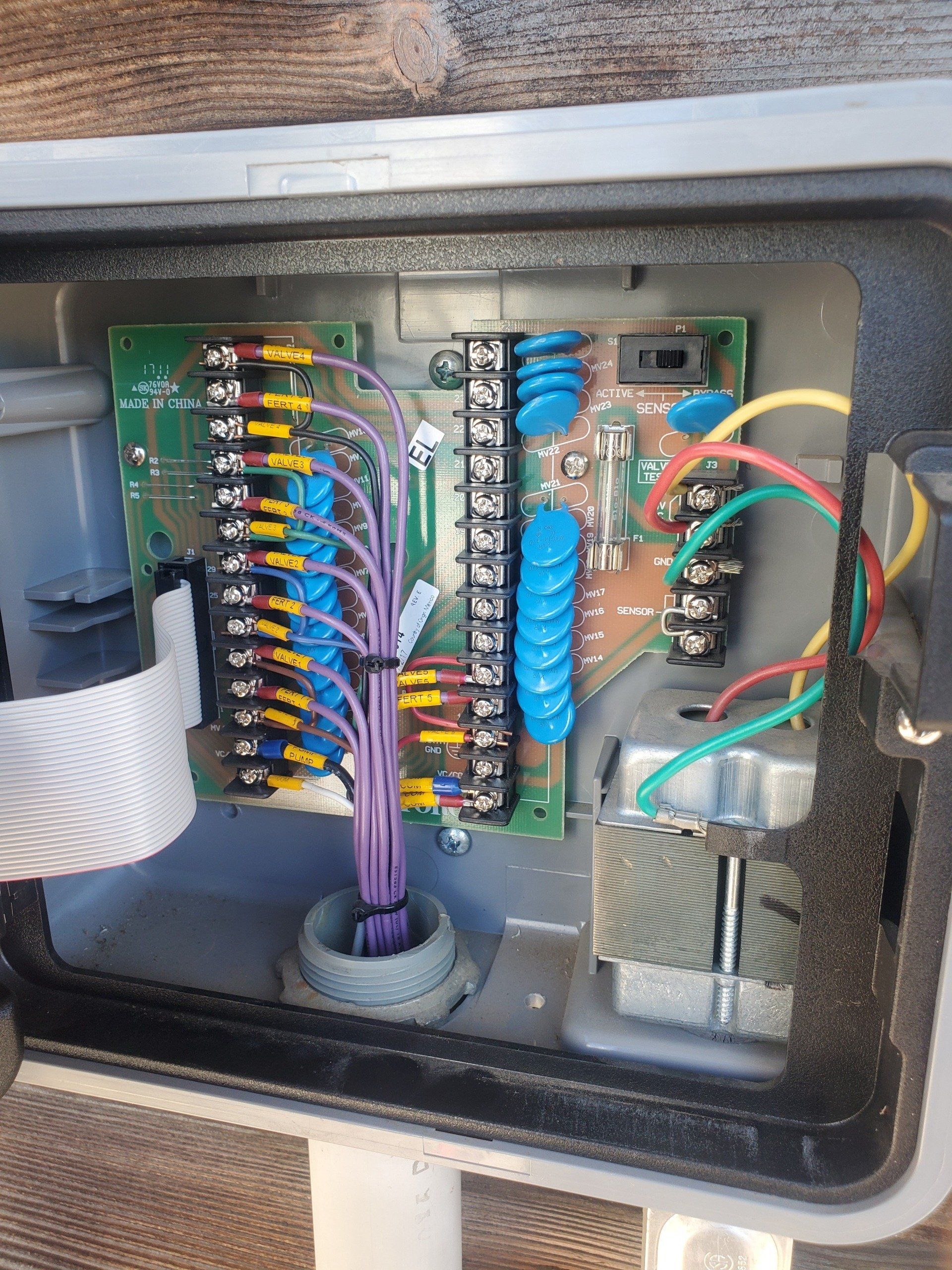 A box with a bunch of wires coming out of it