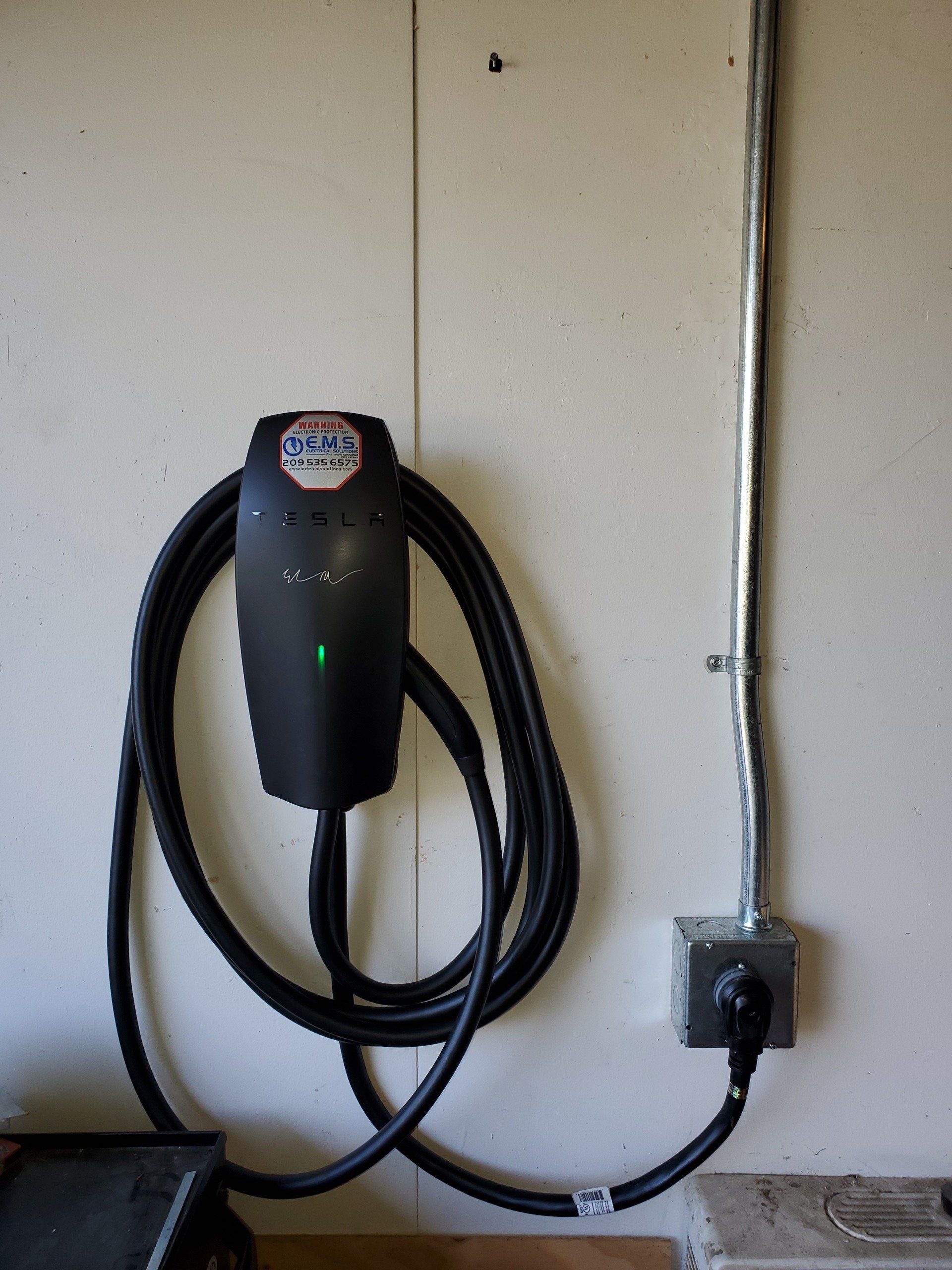 EMS installs tesla charging stations
