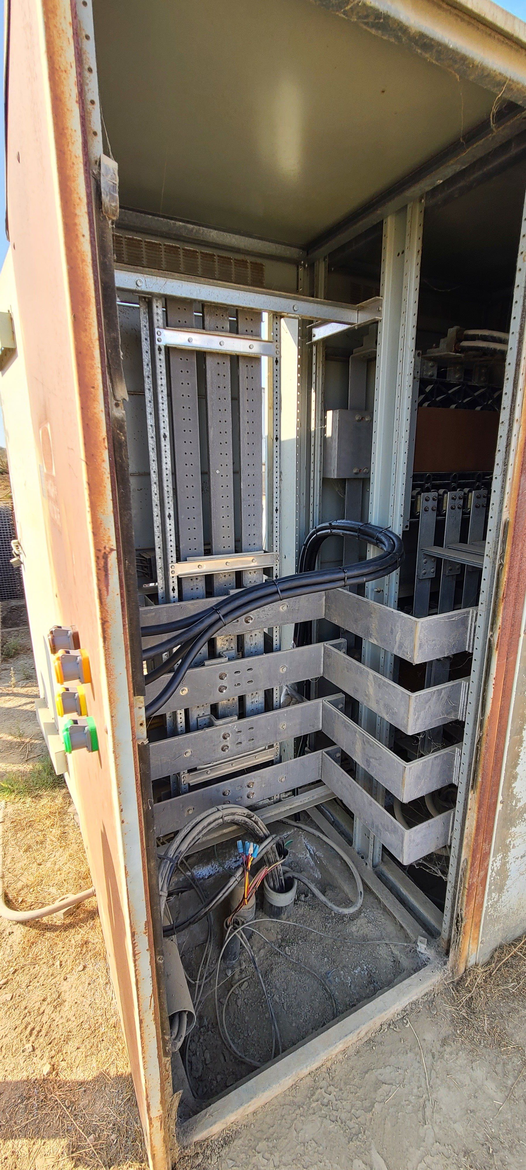 The inside of a building with a lot of wires coming out of it.