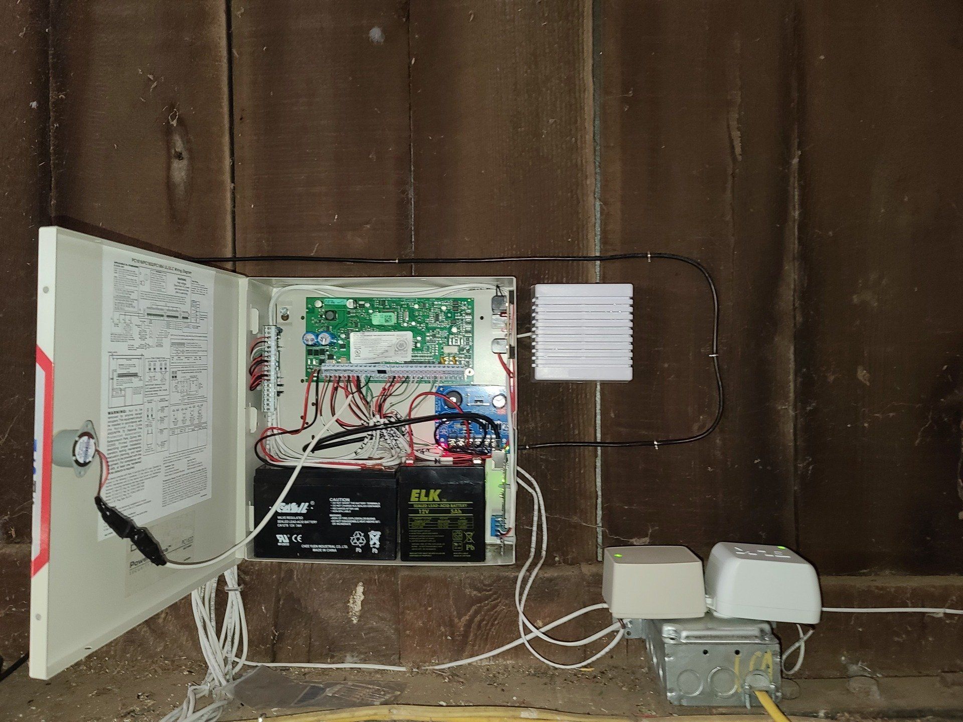 A box with a lot of wires coming out of it