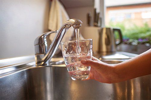 Filling Glass With Tap Water