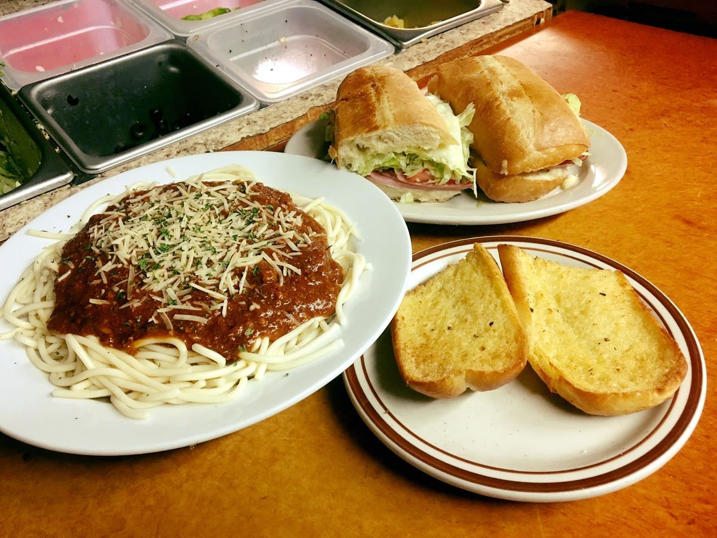 spaghetti, grinder and garlic bread
