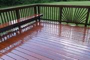 We can restore your ugly pressure treated deck to look like this