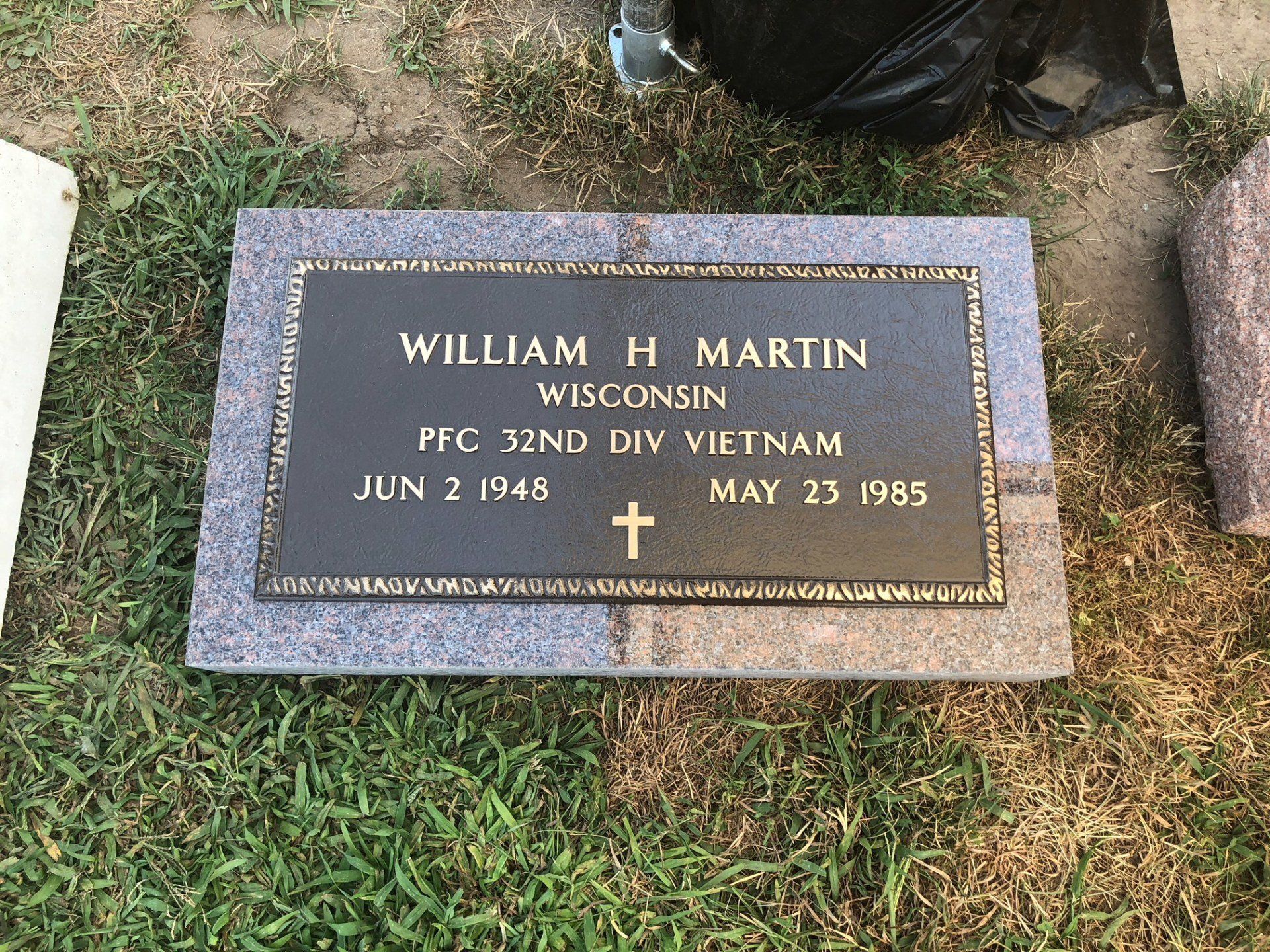 Granite under bronze memorial