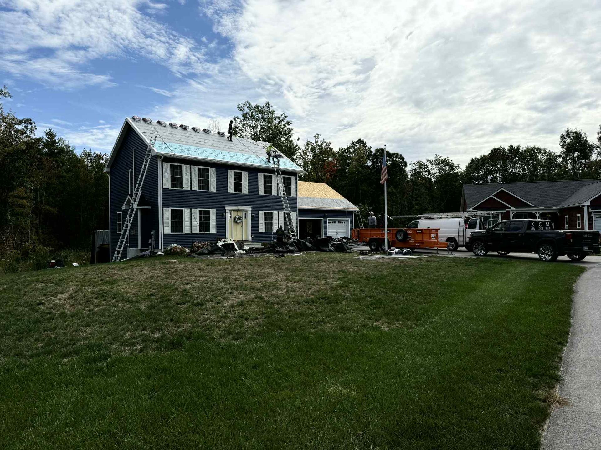 An image showcasing the installation process of a gutter guard system.