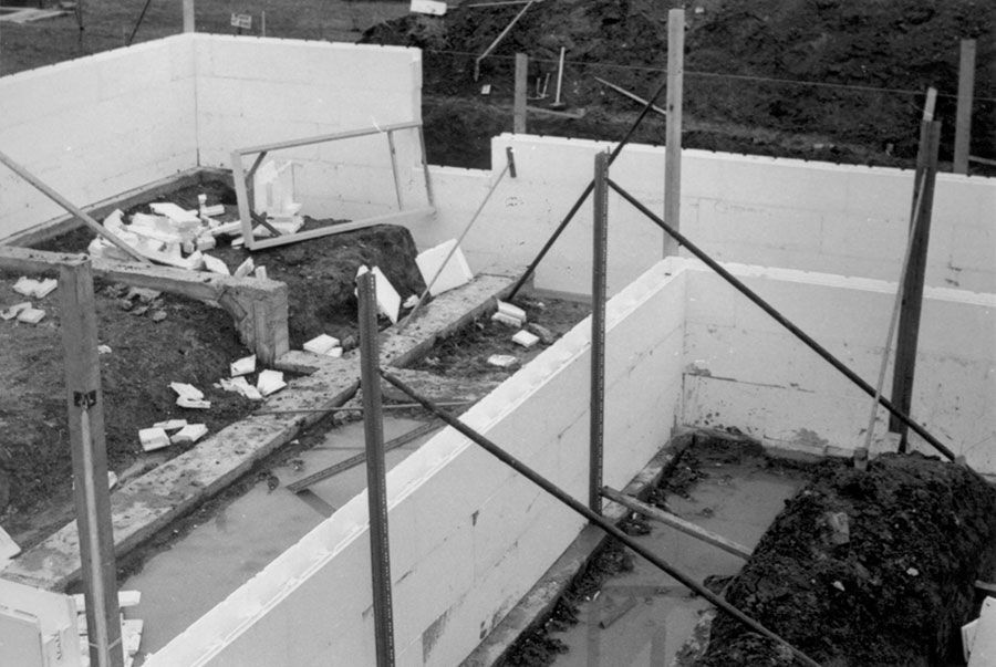 A black and white photo of an ICF building under construction - AR