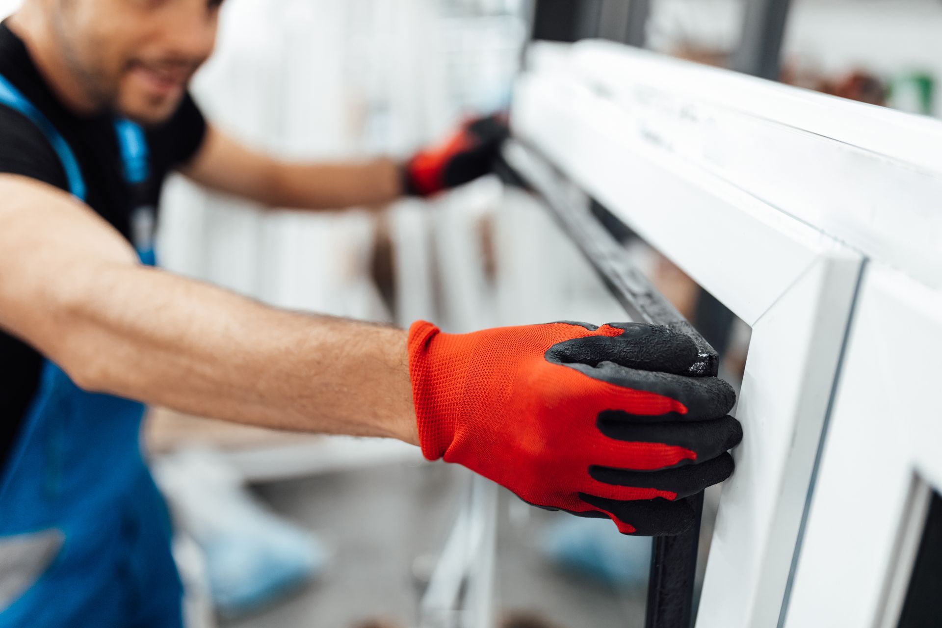 Window manufacturer installing glass pane | Nixa, MO