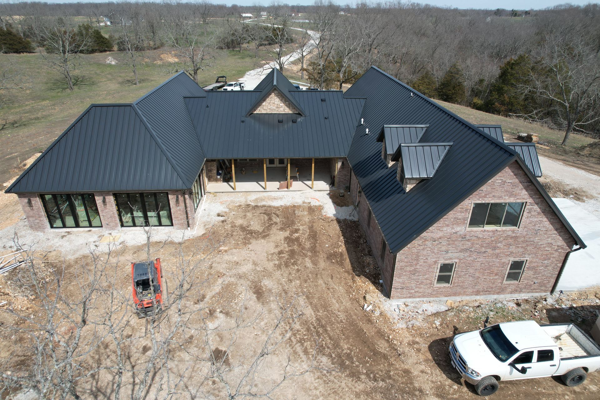 ICF custom home with steel roof and brick exterior | Rogersville, MO