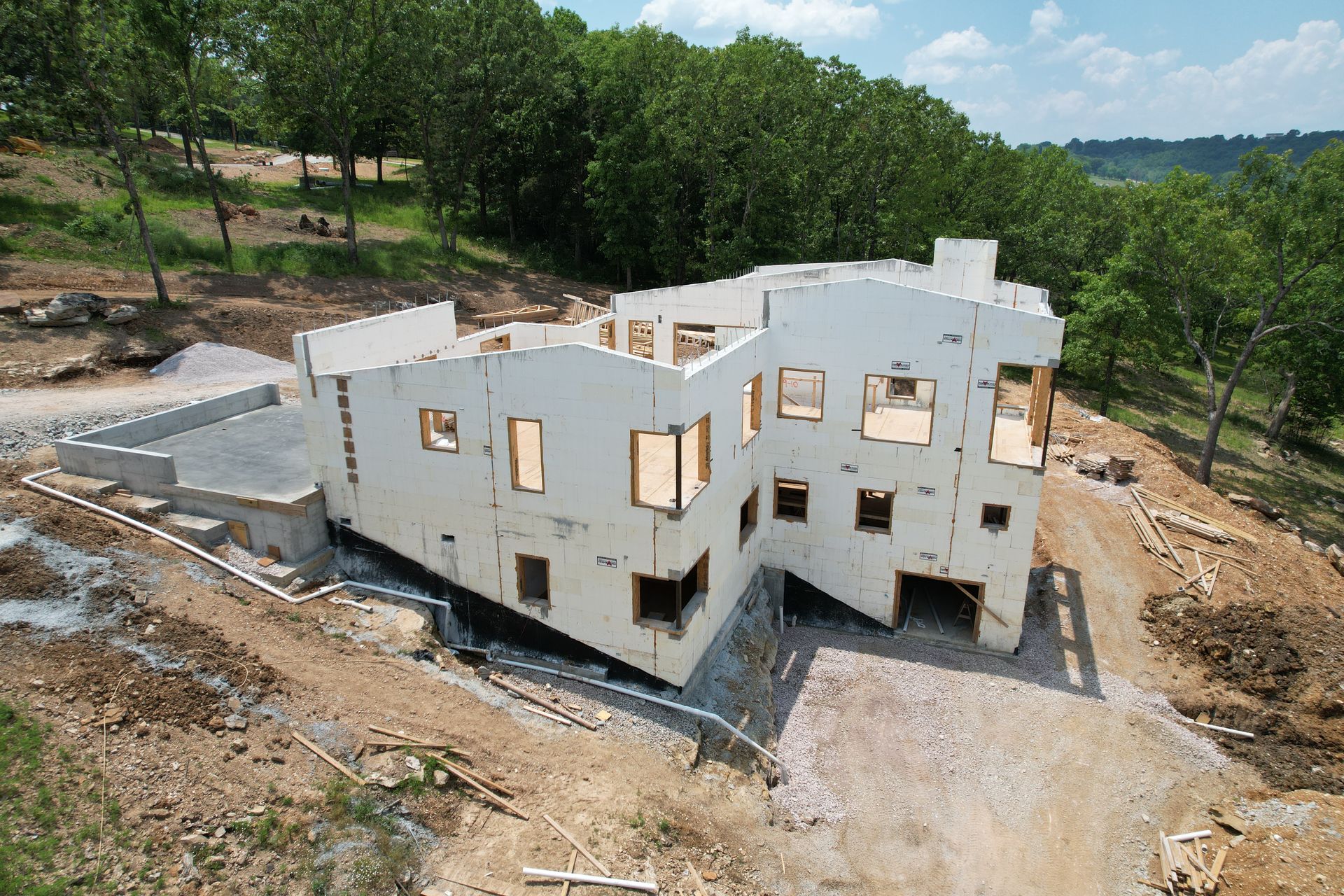 ICF custom home built into hillside overlooking Ozark Mountains | Bentonville, AR