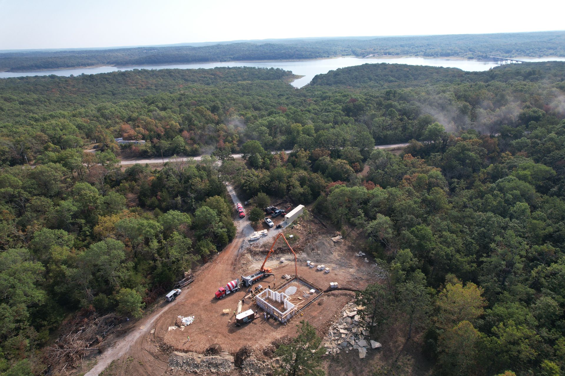 Custom ICF home with attached garage in scenic Ozarks landscape | Lowry City, MO