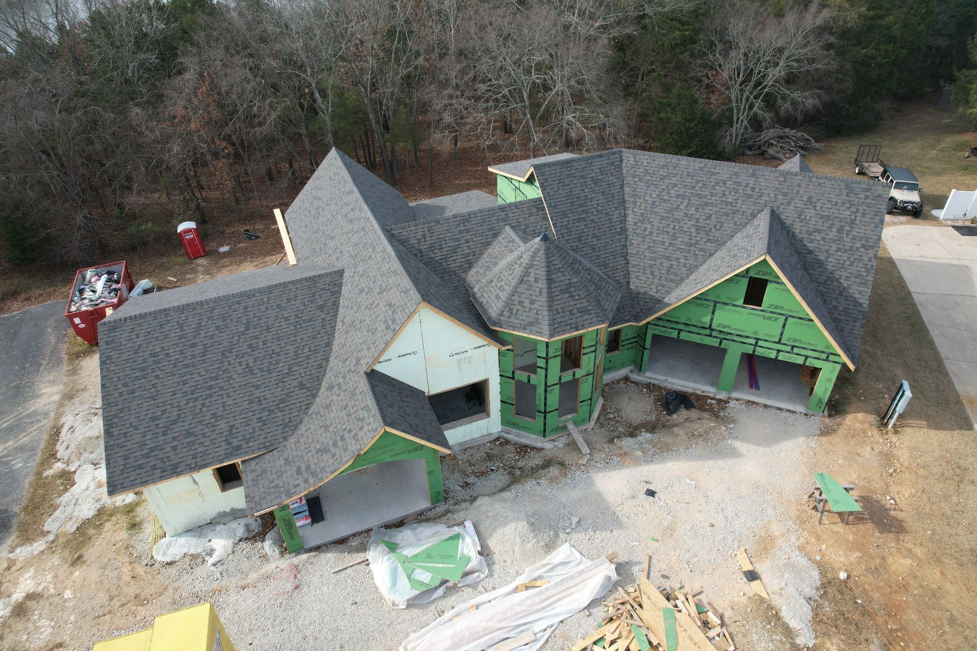 Custom ICF home with shingle roof and Zip System garage | Blue Eye, MO
