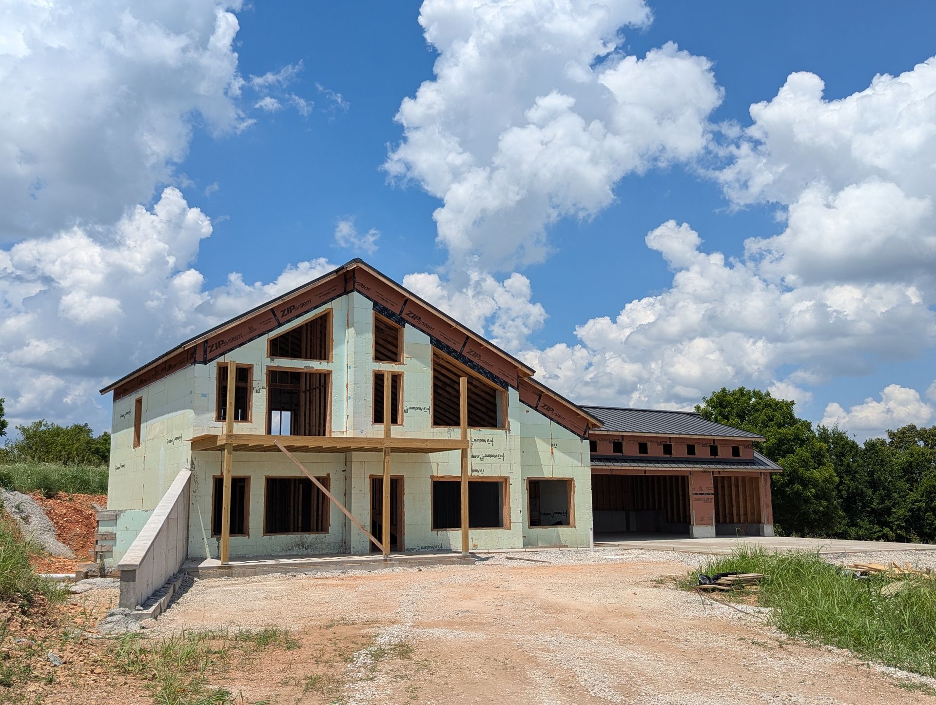 Nudura ICF custom home build with standing seam hidden fastener steel panel roof system | Billings, MO
