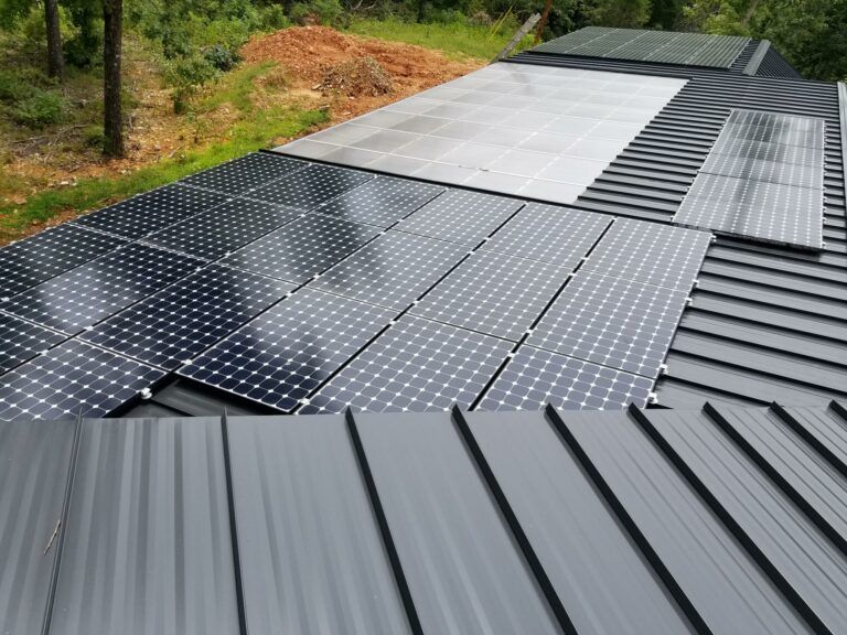 A roof with a lot of solar panels on it | Energy Saving with ICF homes in Branson MO