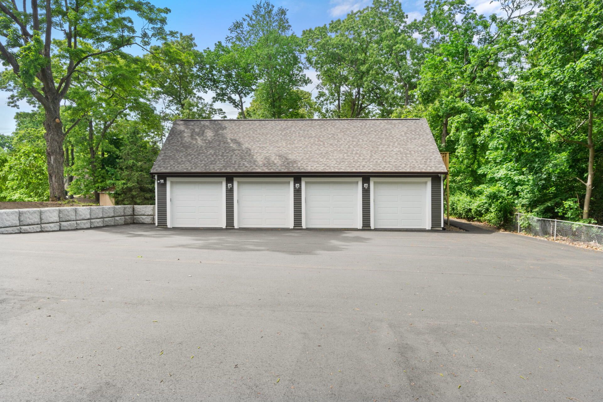 a house with a new paved driveway