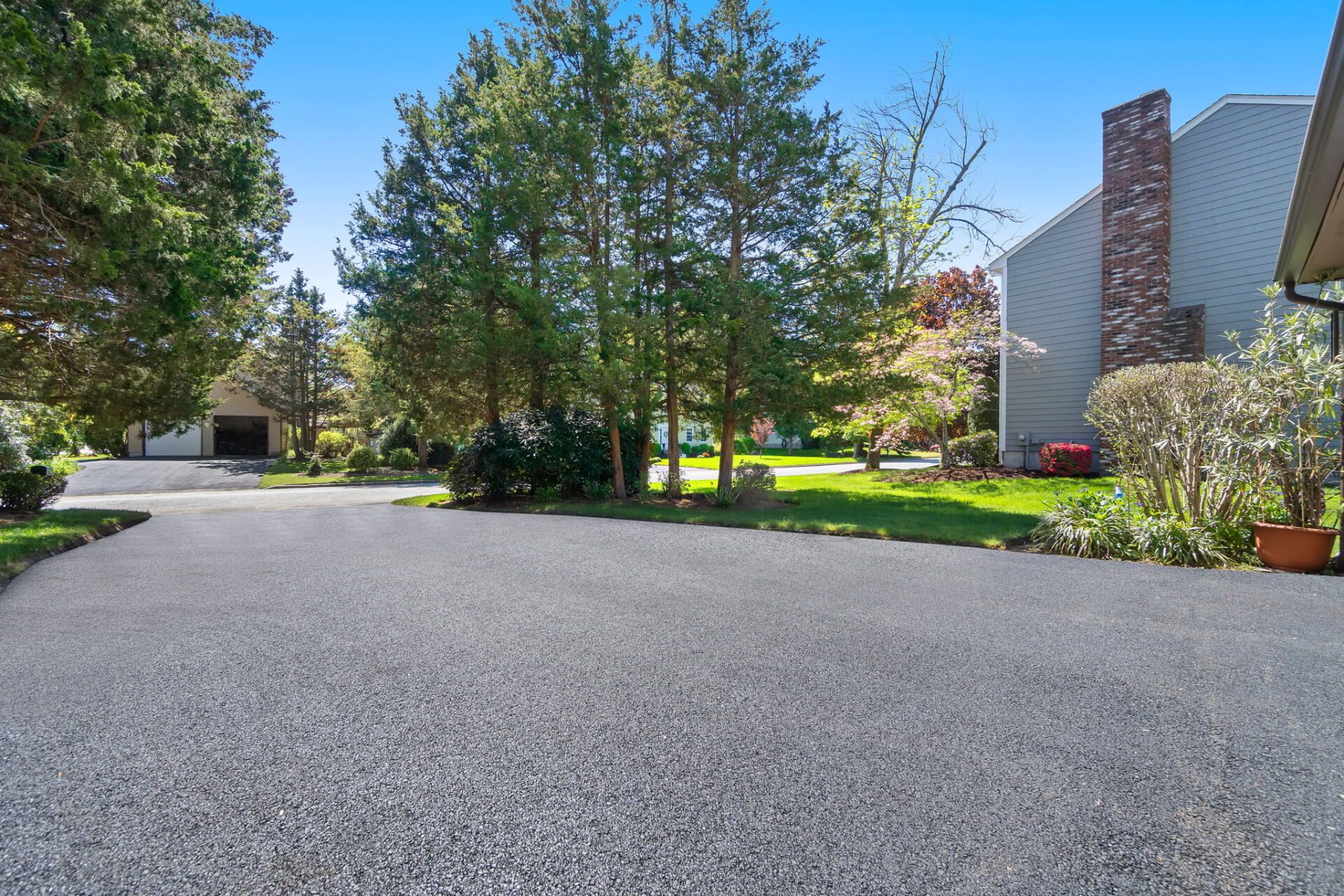 a house with a new paved driveway
