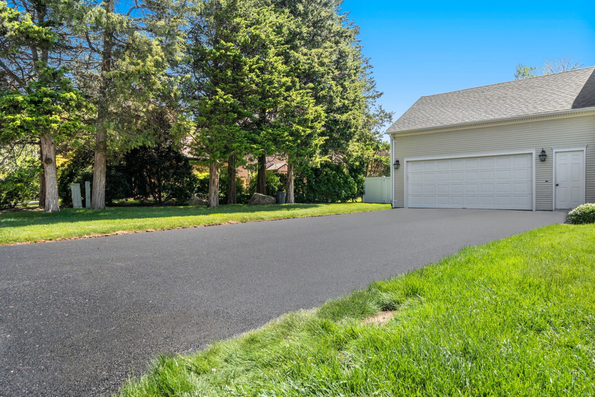 a house with a new paved driveway