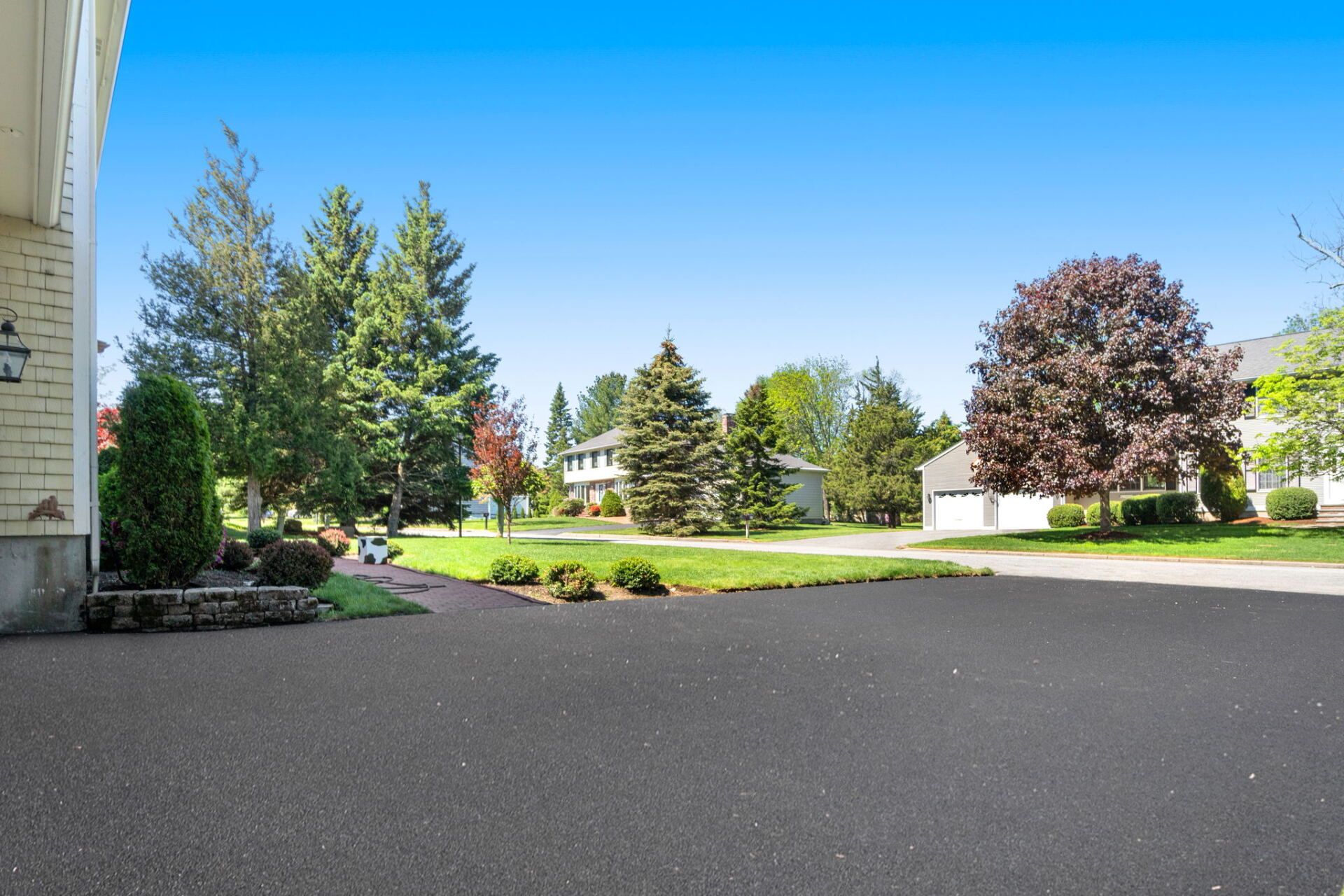 a house with a new paved driveway