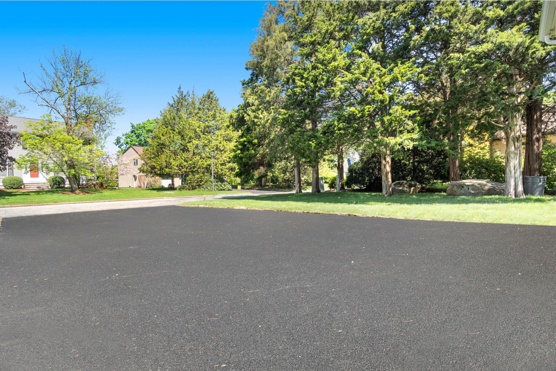 a house with a new paved driveway