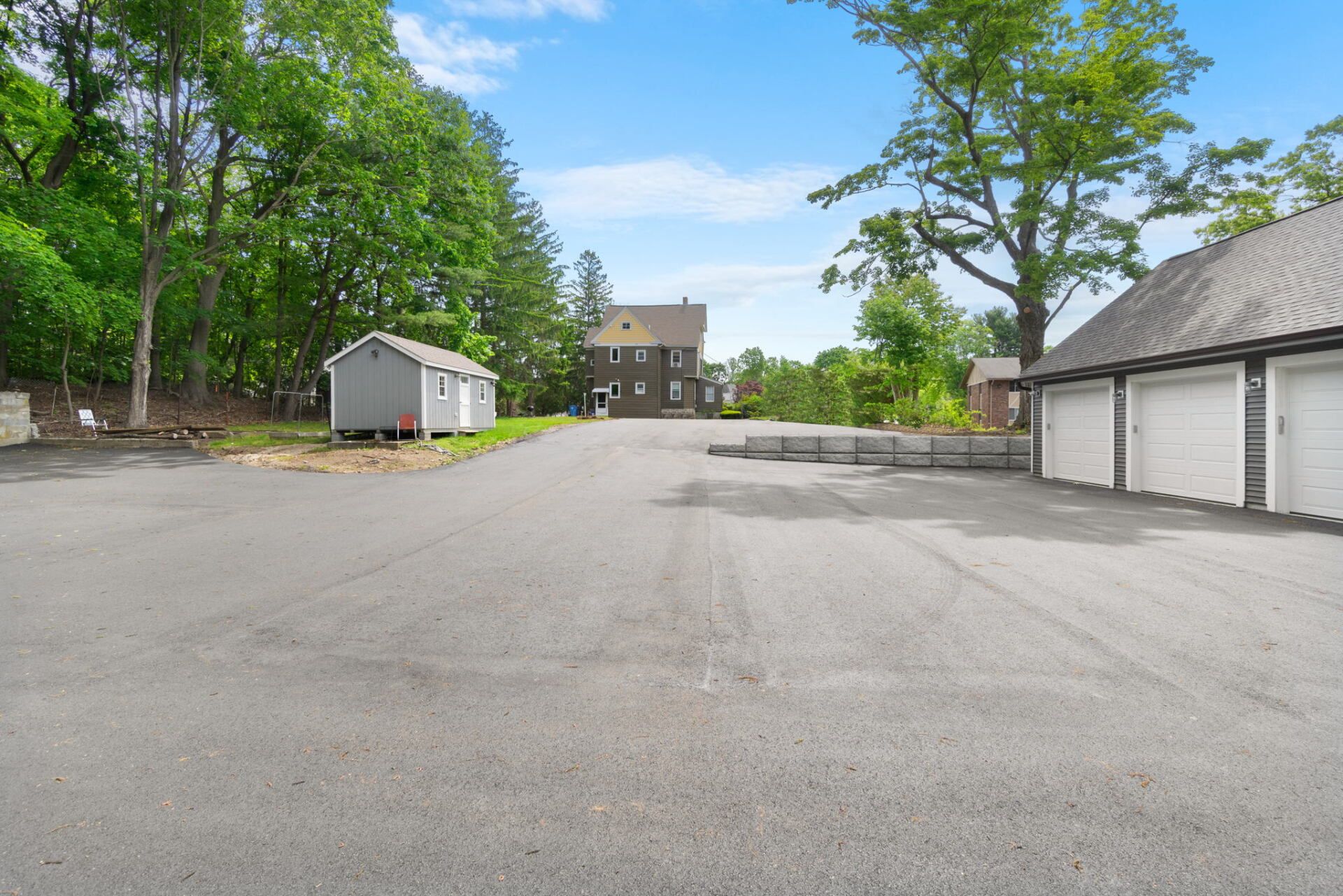 a house with a new paved driveway