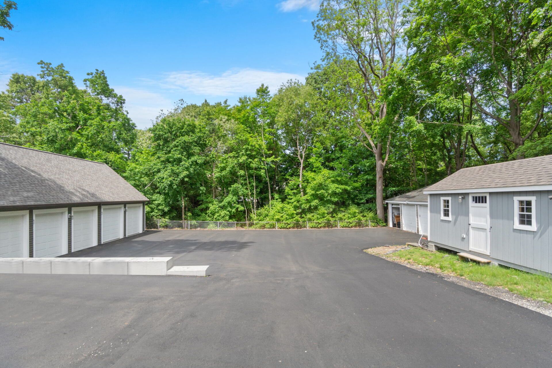 a house with a new paved driveway
