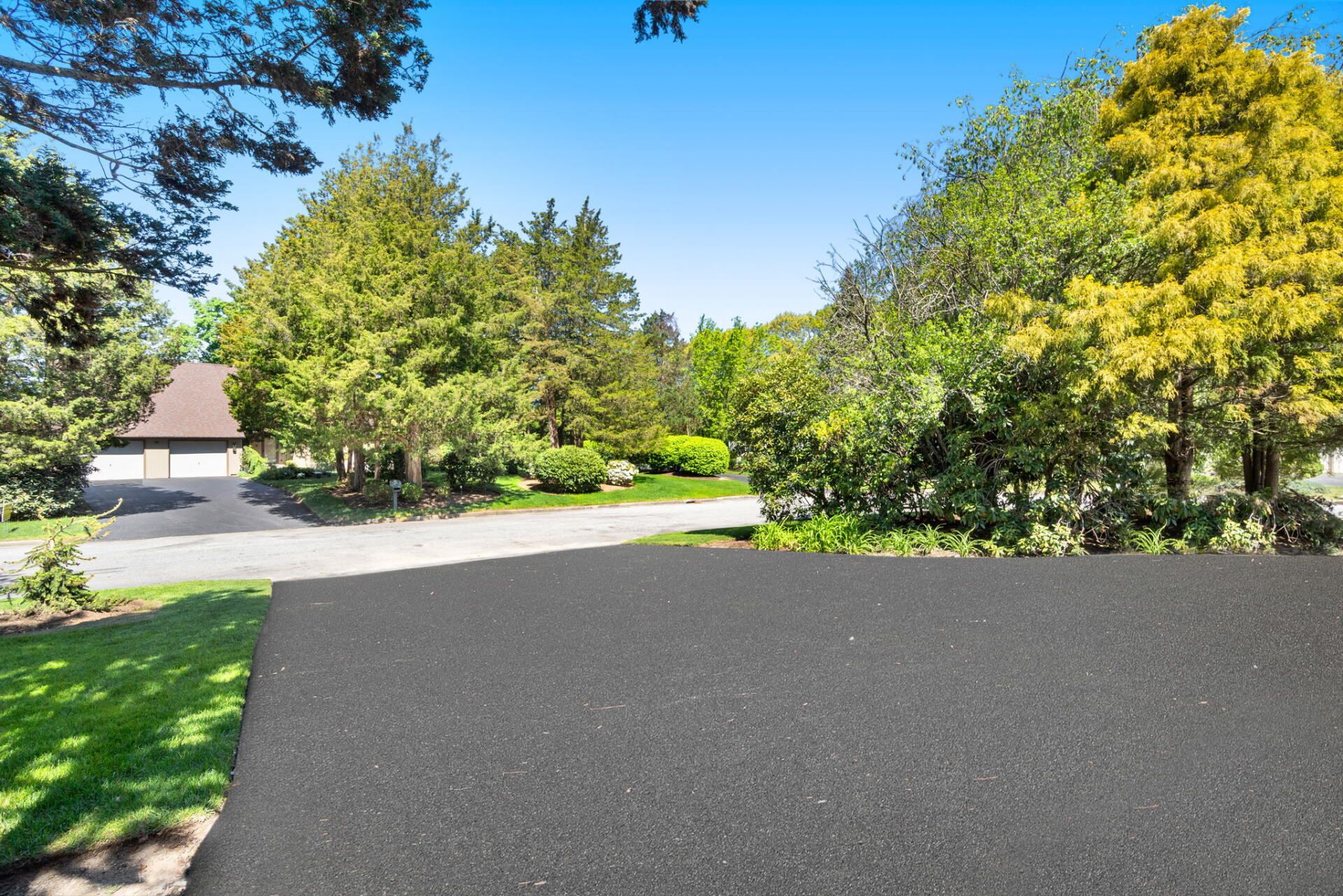 a house with a new paved driveway