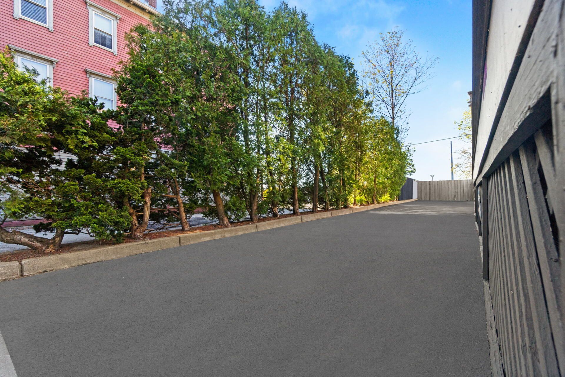 a driveway with a new paved ground
