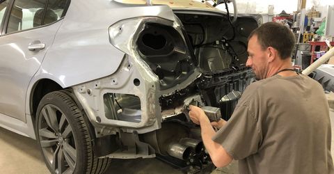 Man Repairing the Car — Corvallis, OR — Free Bird Auto Body & Paint