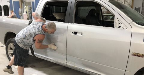 Wiping the White Truck — Corvallis, OR — Free Bird Auto Body & Paint