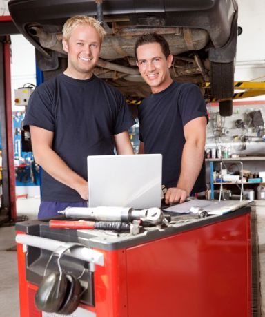 Two professionals working on one of our crash repairs services in Karratha