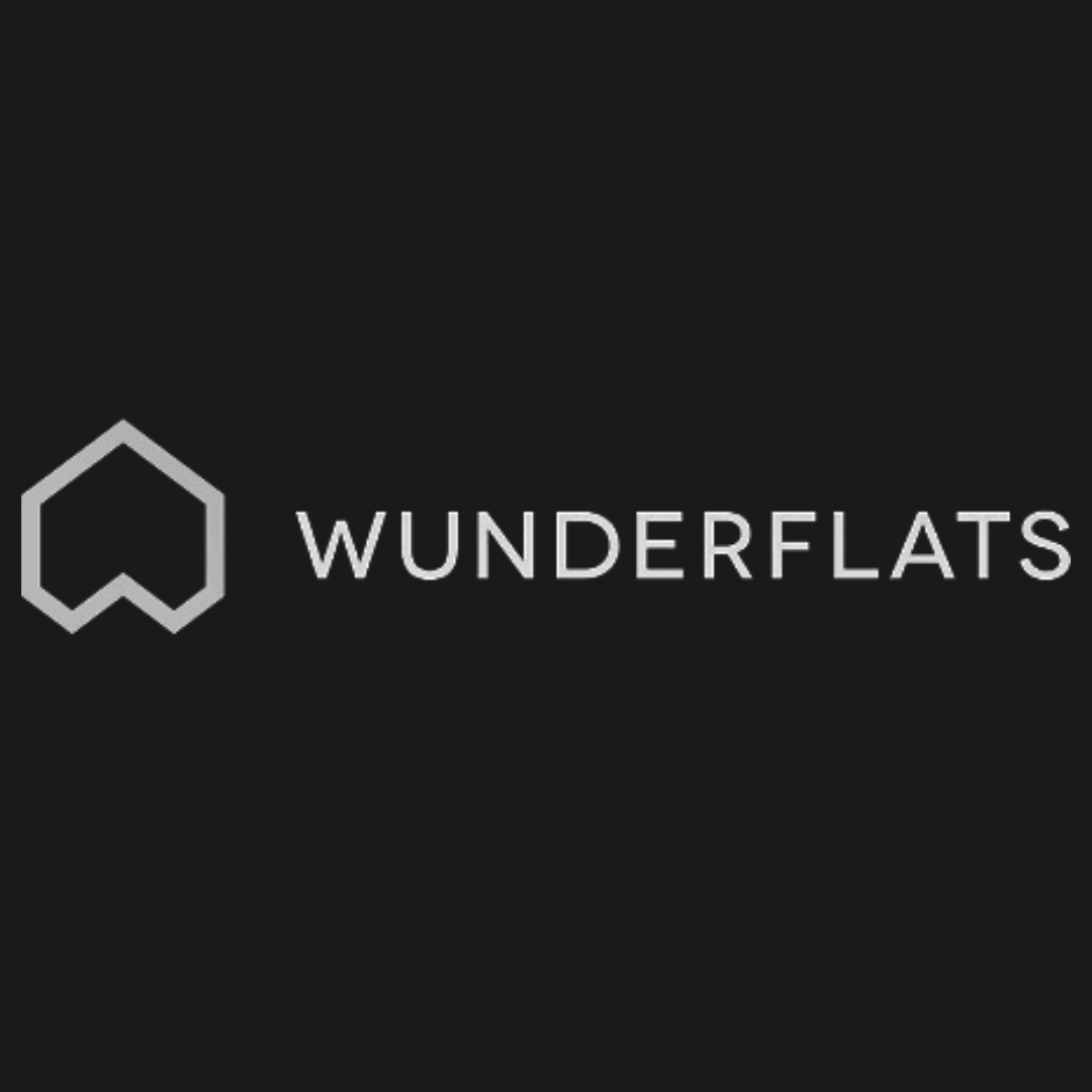 Wunderflats logo: white text and abstract house icon on a dark gray background.