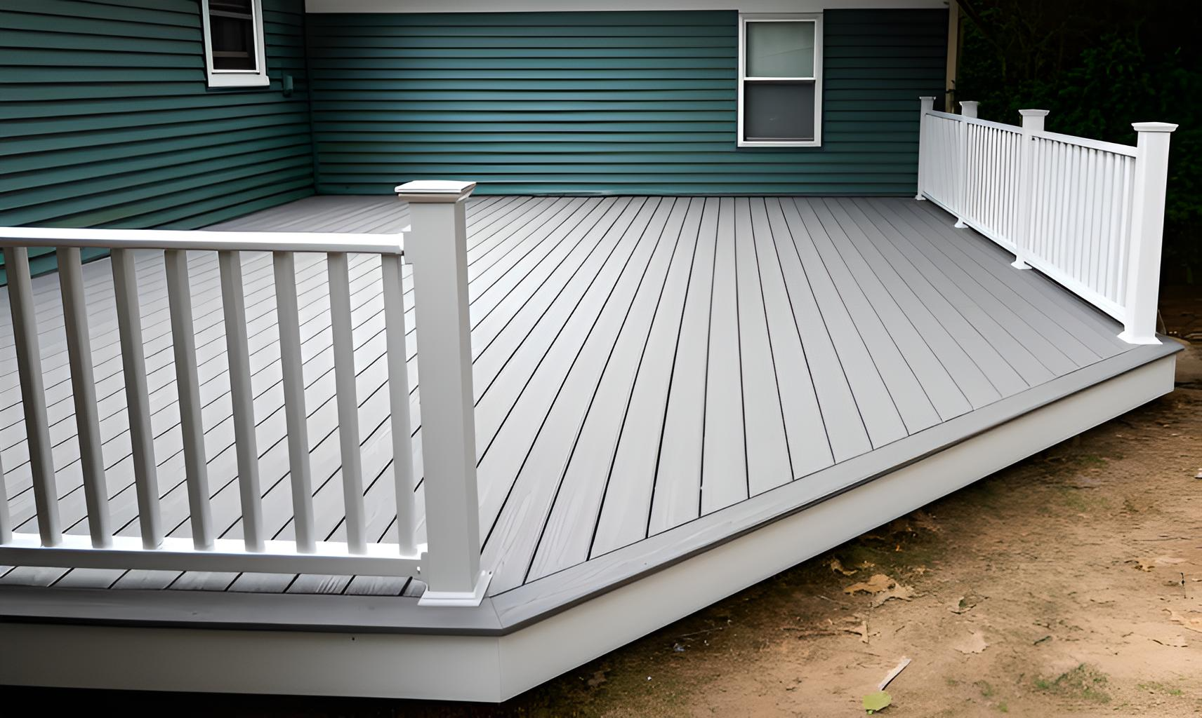 new gray composite deck with white railing installed by quality affordable construction llc in egg harbor township, nj