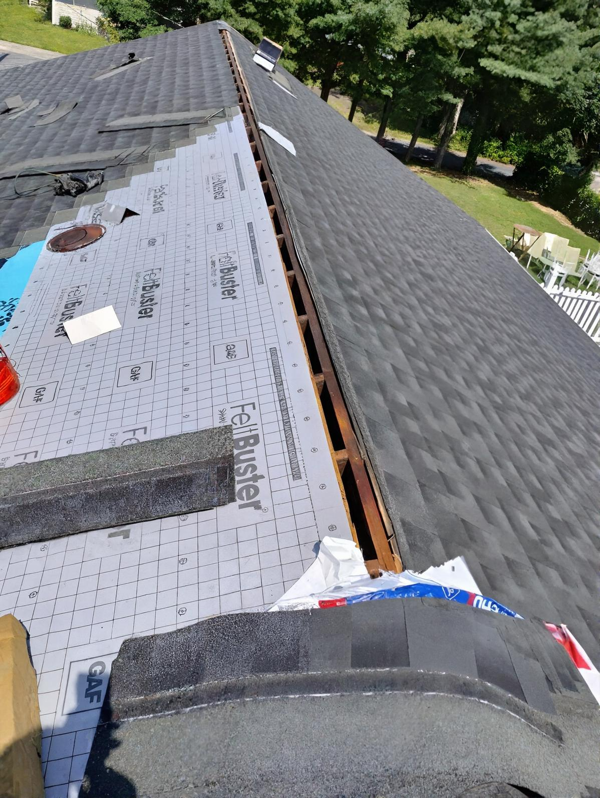 Roof partially shingled, showing underlayment and a row of shingles in progress in somers point, nj done by quality affordable construction llc