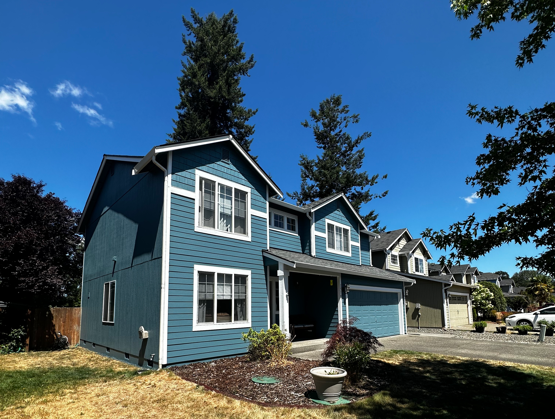 Blue wood house - Spanaway, WA | Top Grade Development