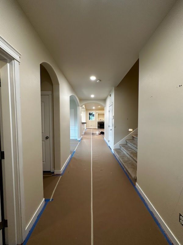 Hallway before - Spanaway, WA | Top Grade Development