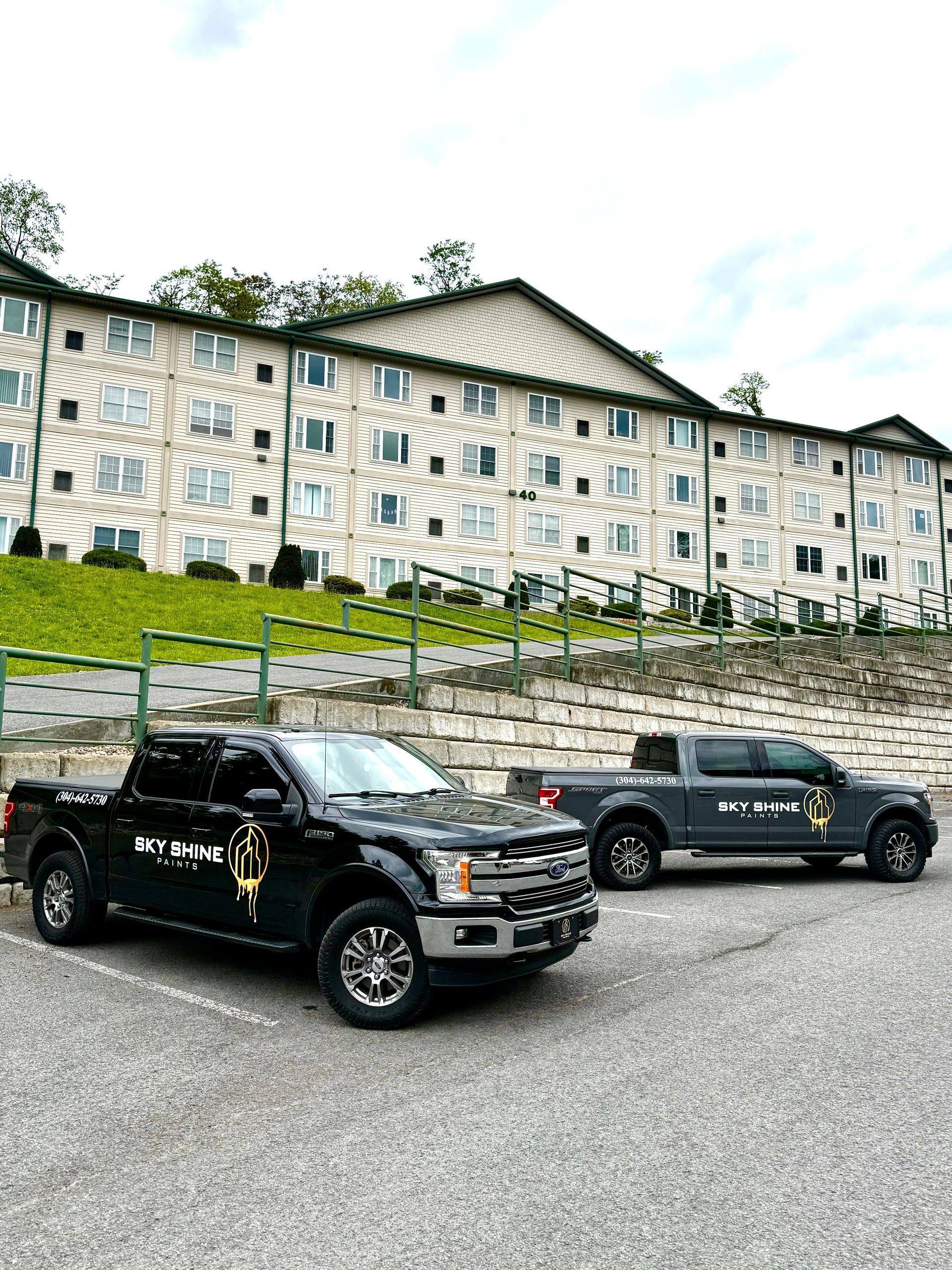 A bathroom with red walls and a sink and mirror