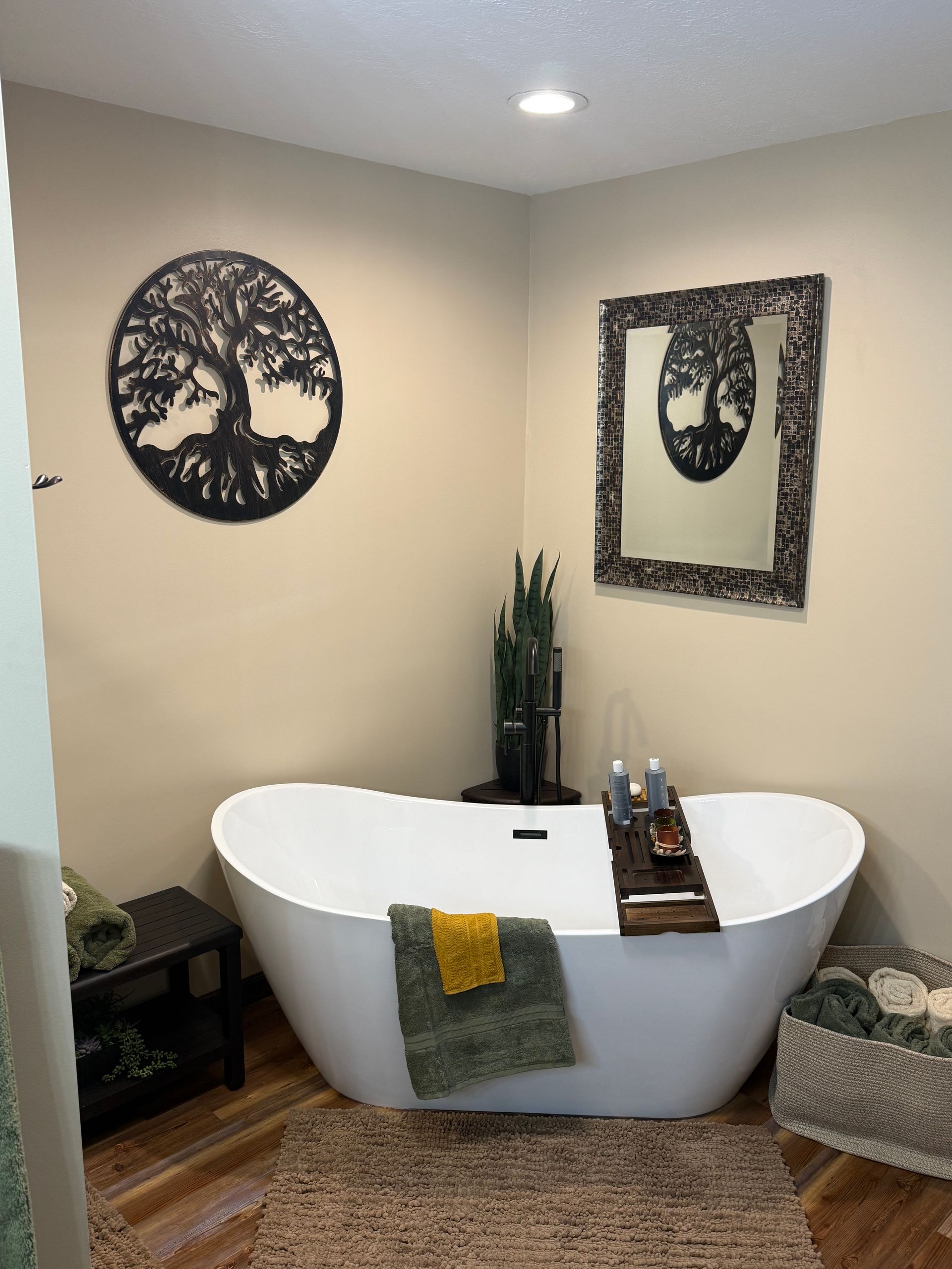 A long hallway with a red exit sign on the ceiling