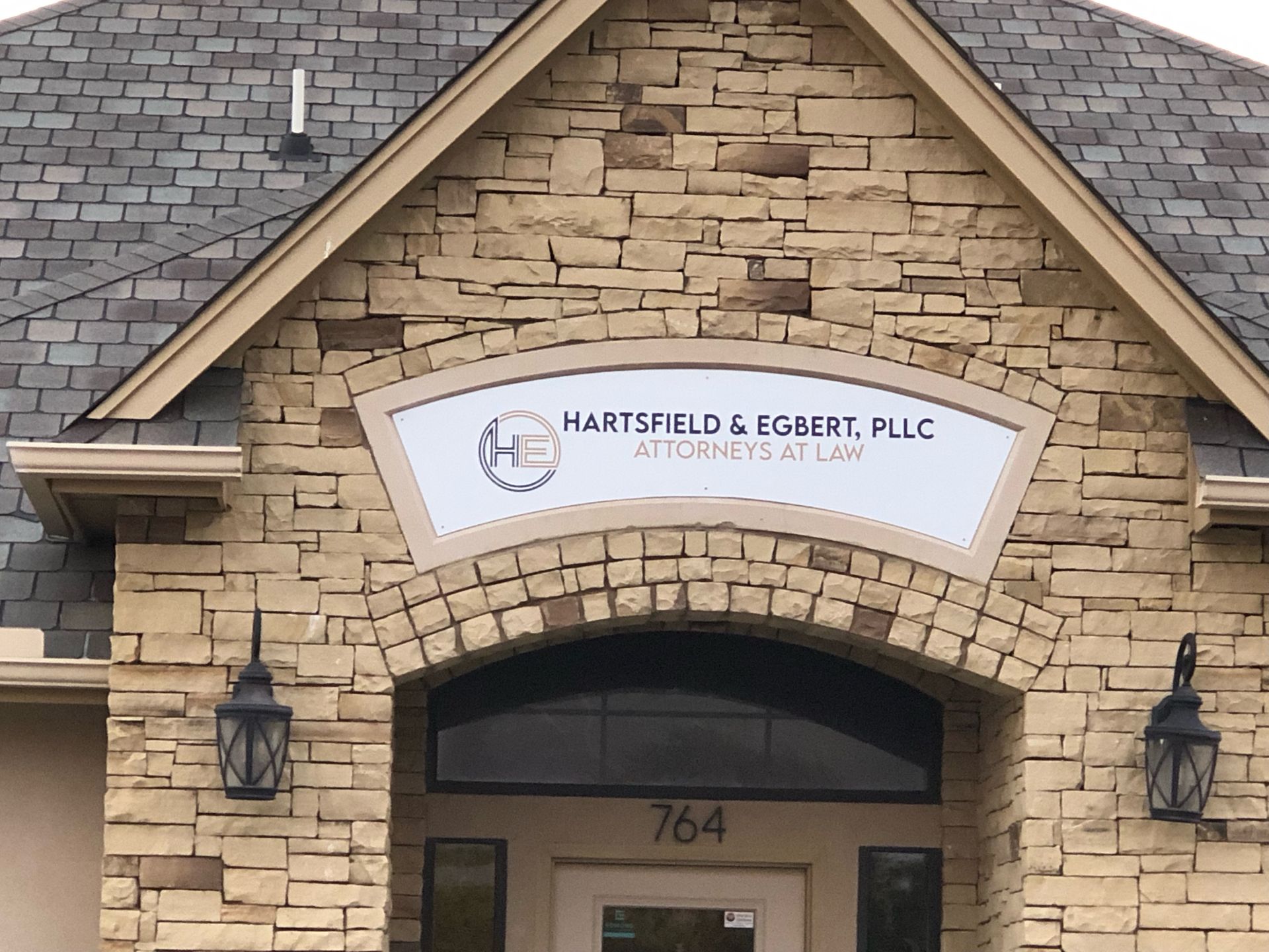 Custom aluminum building sign with printed vinyl graphics in Oklahoma City
