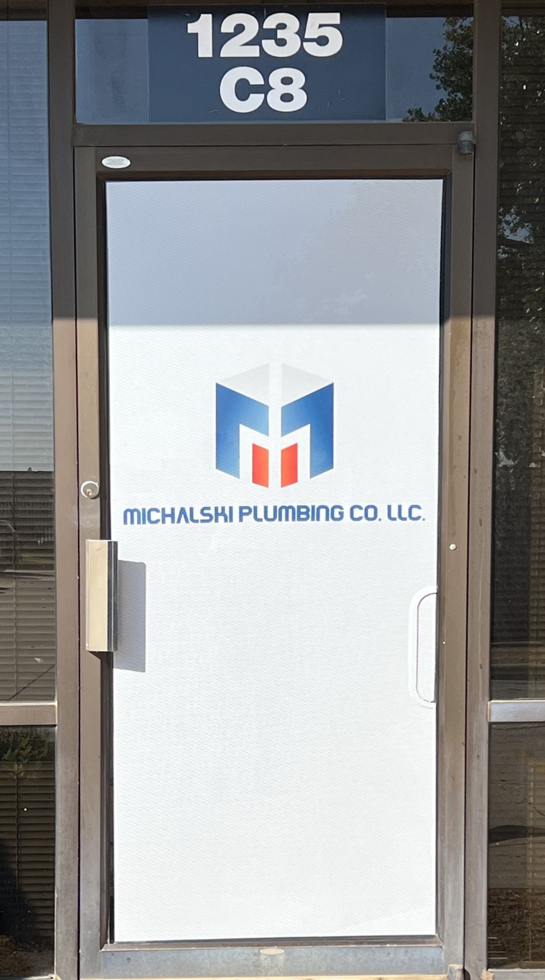 See-through vinyl window perf graphics for business doors and windows OKC