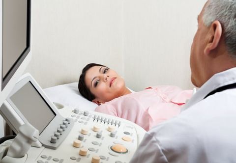 Woman being examined by doctor