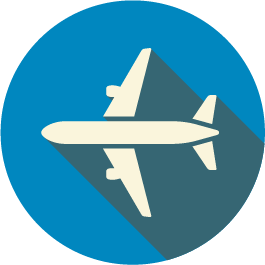 An airplane icon with a long shadow on a blue circle