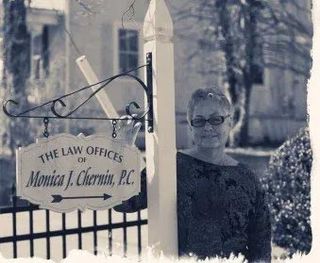 Monica Cherin Standing beside her Signage — Culpeper, VA — Law Offices of Monica J Chernin