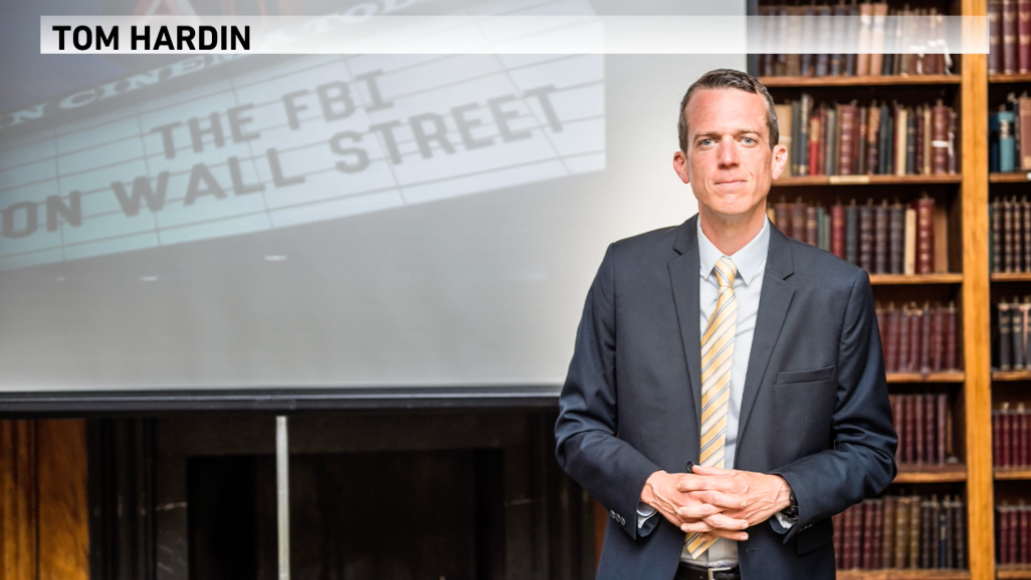 Ron Shaich is smiling in front of a panera bread store