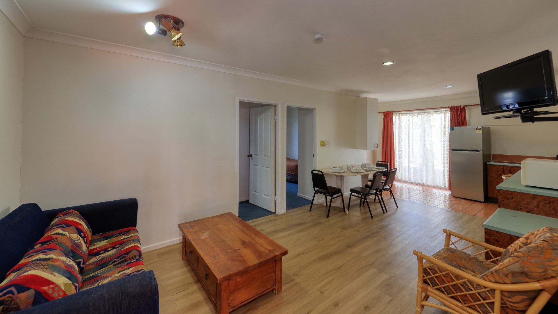 Two Beds In The Maroon Color Bedroom With Big Mirrors — Townview Motel In  Mount Isa QLD