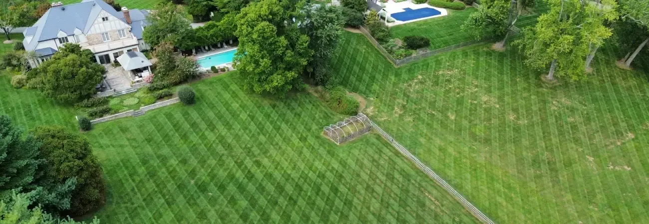 Professional lawn maintenance service in Spring Grove PA with neatly trimmed grass and expert yard care