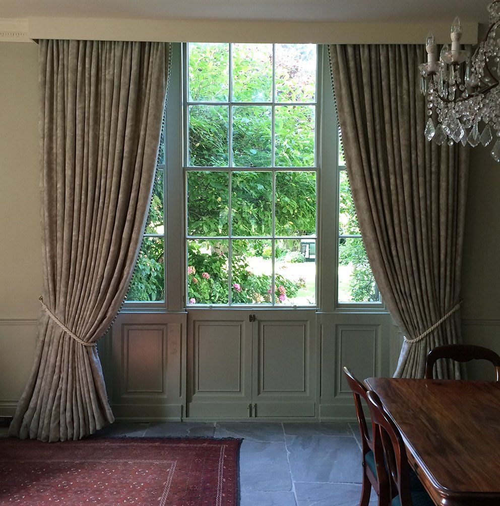 heavy bespoke drapes at a Georgian French door.