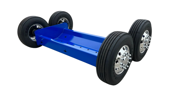 Blue trailer dolly with four tires on a white background. Blue trailer dolly with four tires on a white background.