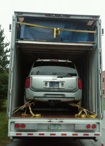 Motorcycle Hauling Company — Car Inside The Delivery Truck in Oneonta, AL