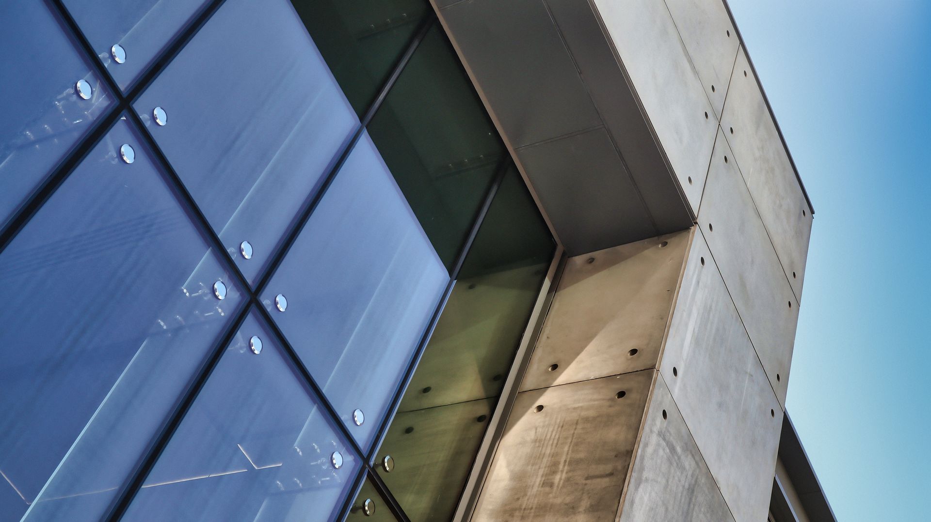 Generic modern minimal view of a glass business tower. Generic modern minimal view of a glass business tower.
