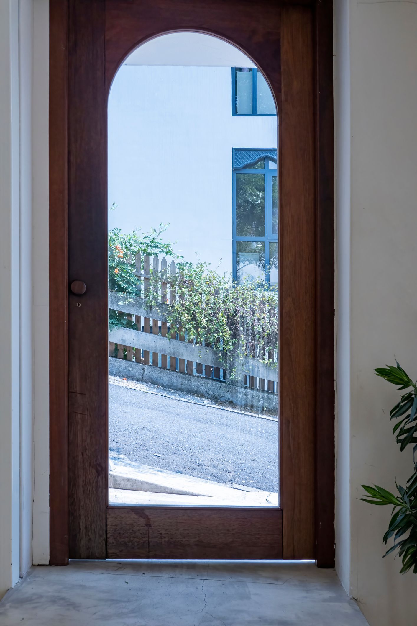 Street view outside the glass door, featuring residential glass products in Garfield, NJ by AAA Meta